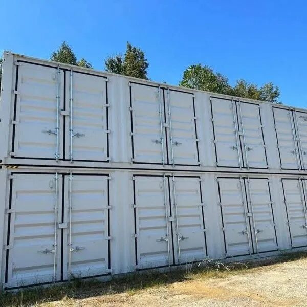 Trucks loading containers at a distribution depot
