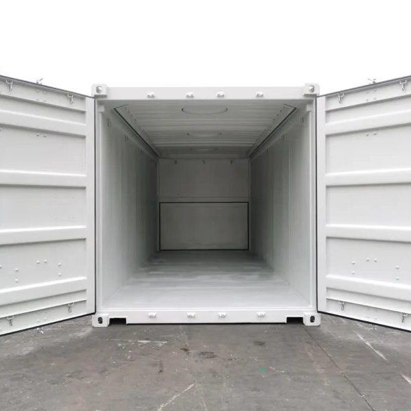 Yard worker inspecting the door seals of a shipping container