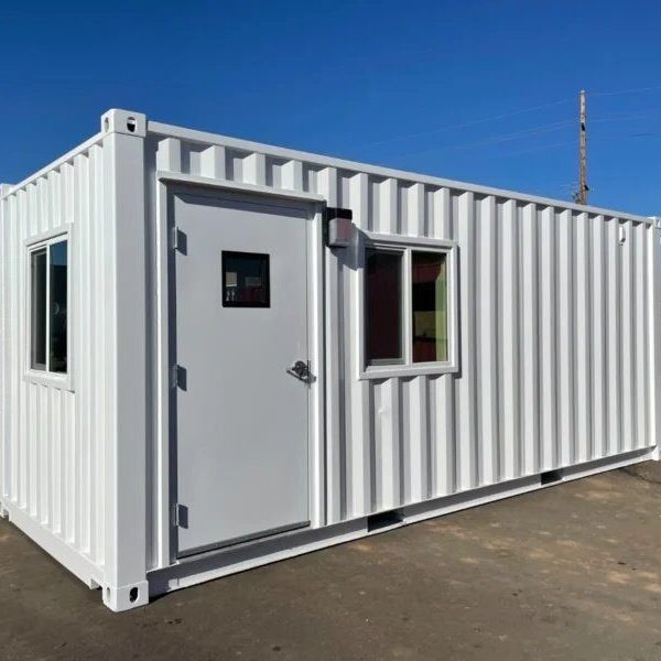 Modified container fitted out as a site office with windows and steps
