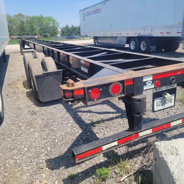 Container chassis trailer parked at a logistics depot