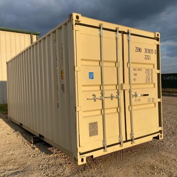 Blue 40ft shipping container standing in a gravel yard