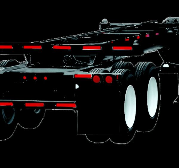 Tri-axle container chassis trailer parked at a freight depot