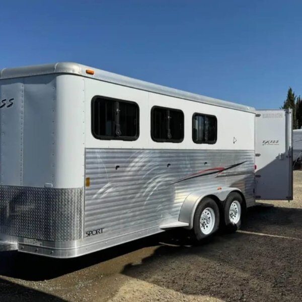 Three horse slant load trailer with a side tack room door